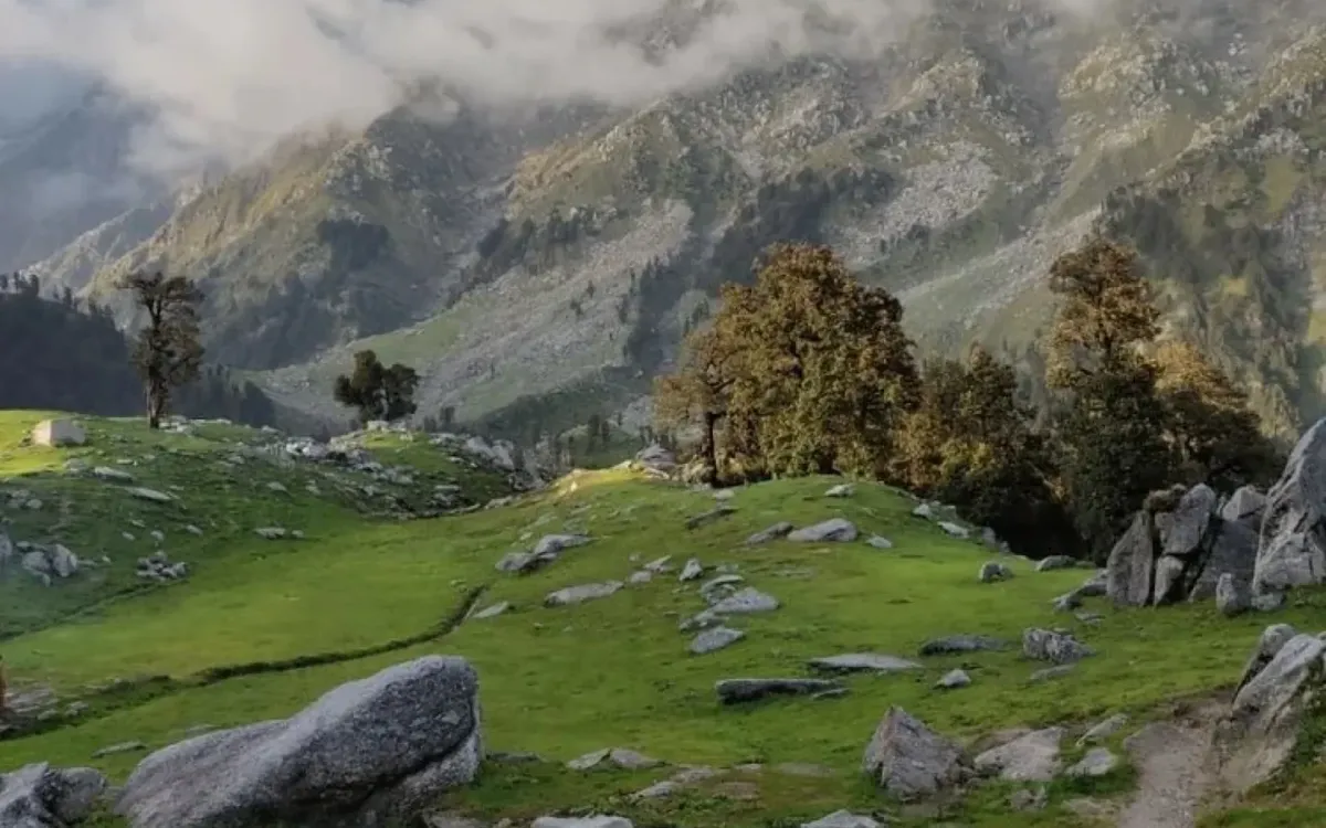 A boulder-strewn meadow on the climb toward Indrahar Pass